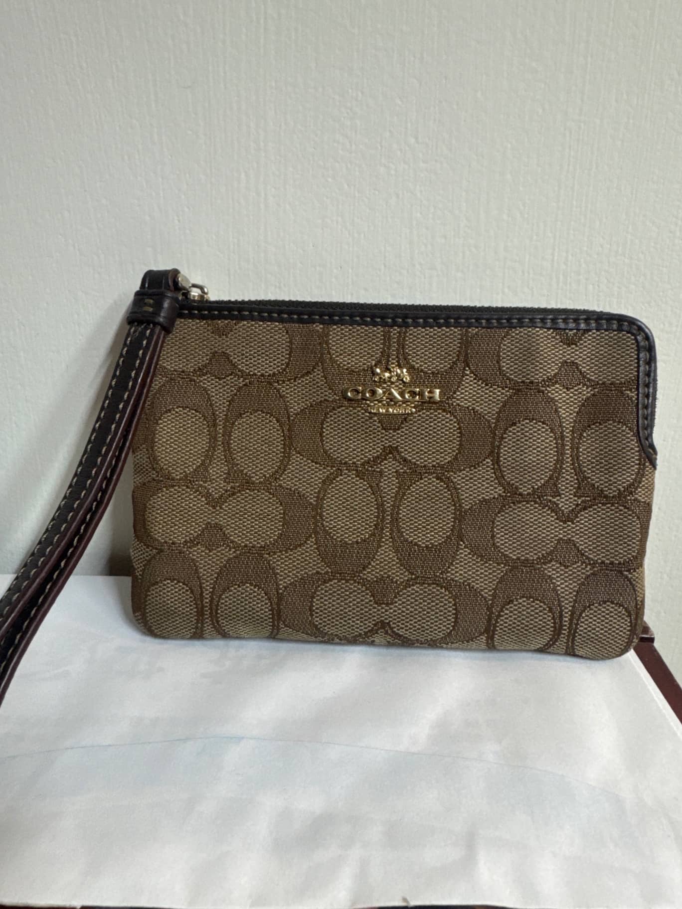 COACH Signature 經典老花手拿包 1個